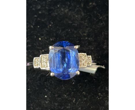 9ct White gold ring set with 3.23 carat oval sundar kyanite &amp; 0.04 carat white zircon with coa Size R