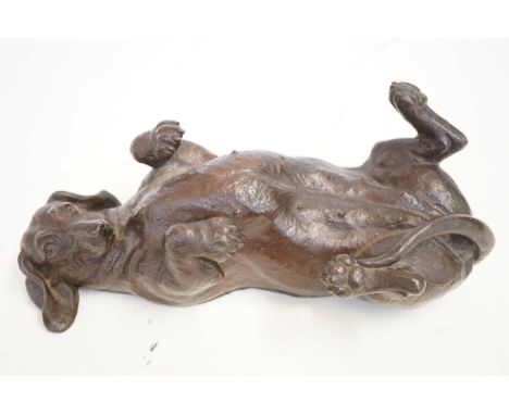 Dorris Linder bronzed resin model of a daschund restoration to paw