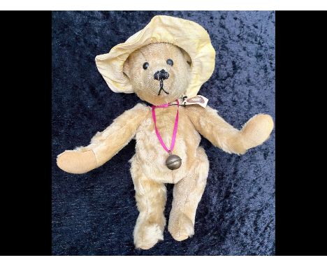 Vintage Norberry Bear, in beige fur with hump back and suede paw pads.  Measures approx 10''.  Labels attached.   