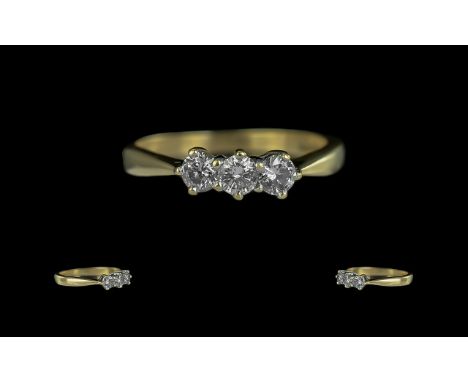 Ladies 18ct Gold 3 Stone Diamond Set Ring. Full Hallmark to Shank. The 3 Round Faceted Diamonds of Excellent Colour / Clarity