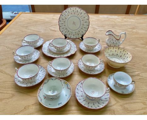 Lustre Tea Set Circa 1840, comprising milk jug, sugar bowl, eight cups, seven saucers, and two bread and butter plates, with 