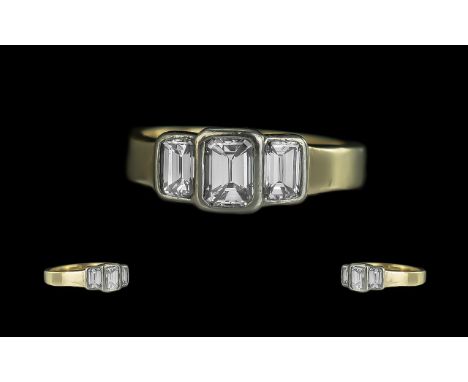 Ladies 18ct Gold - Good Quality Modern 3 Stone Diamond Set Dress Ring. Full Hallmark to Interior of Shank. The 3 Emerald Cut 