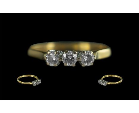 18ct Gold Attractive 3 Stone Diamond Set Ring, marked 750 - 18ct to shank.  The three round cut diamonds of good colour and c