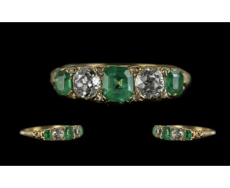 Antique Period 18ct Gold Attractive and Good Quality Five Stone Emerald and Diamond Set Ring, Gallery Setting. The Emeralds o