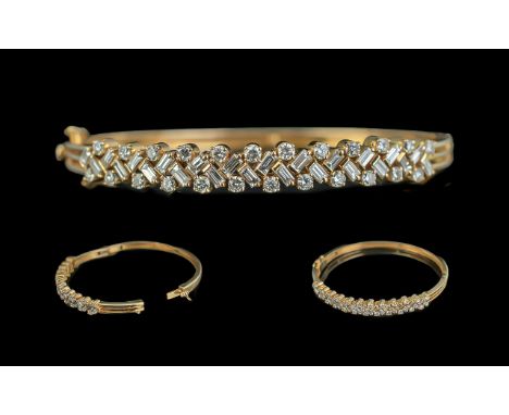 Ladies - Superb Quality 18ct Gold Diamond Set Hinged Bangle. The Step-cut and Brilliant Cut Diamonds of Excellent Colour / Cl