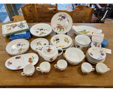 Quantity of Royal Worcester 'Evesham' Porcelain, comprising tea pot, cake stand, four cups, saucers and side plates, flan dis