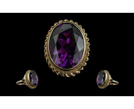 Ladies Attractive 9ct Gold Single Stone Amethyst Dress Ring, the large oval faceted Amethyst of excellent colour and clarity.