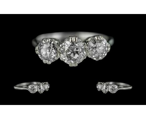 Ladies Platinum 3 Stone Diamond Ring. Marked Platinum to Interior of Shank. The 3 Round Faceted Diamonds of Excellent Colour 