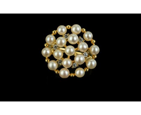 Akoya Pearl Cluster Ring, a circular, open cluster of the wonderful quality Japanese Akoya cultured pearls, the naturally sma