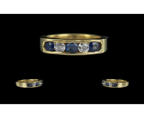 Ladies 18ct Attractive Sapphire and Diamond Set Ring, full hallmark, the round, faceted diamond and sapphires of good colour;