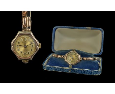 Rolex Ladies 9ct Gold Cased Six Sided Mechanical Wrist Watch, with 9ct Gold expanding bracelet.  Both case and bracelet marke