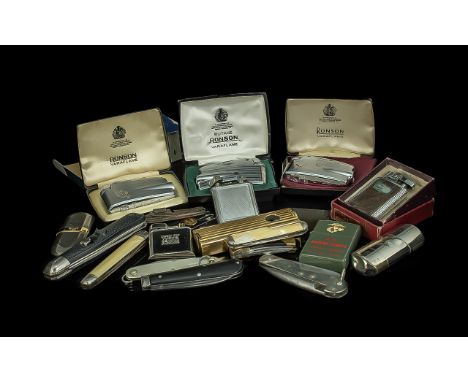 Interesting lot comprising vintage lighters including 4 boxed Ronsons (10 in total) and a collection of pen knives.