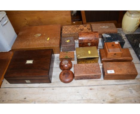 A collection of various wooden trinket boxes and others 
