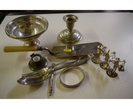 A box containing Sterling silver pedestal bowl; Sterling silver candlestick; silver crumb tray; silver snap bangle etc.