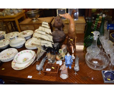 A model three masted sailing ship; various wooden and porcelain ornaments; and a burr wood trinket box
