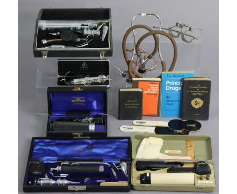 Various vintage doctor’s implements &amp; books.