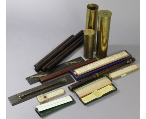 Three brass shell cases; a rosewood recorder (lacking mouthpiece); &amp; various rulers.