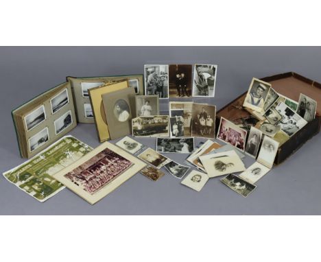 Various vintage family photographs in one album &amp; loose; &amp; a gilt photograph frame. 