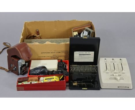 A Pentax “Auto 110” camera; a Gumig cine camera; a Grundig “Stereo mixer” (no. 608); a Casio computer quartz (model ca1), etc
