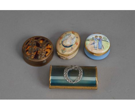 A Kigu enamelled gilt metal oval make-up canister, 7.5 cm by 4.1 cm by 2.8 cm, together with an Art Deco Studs &amp; Links ci