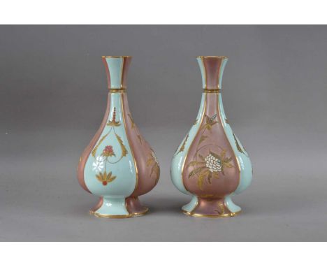 A Pair of Royal Worcester ceramic vases,  baluster body, duck egg blue and purple with heightened gilt, both with printed mar