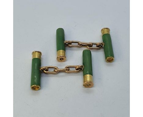 An unusual pair of gold and enamel cufflinks, in the form of green shotgun cartridges 
