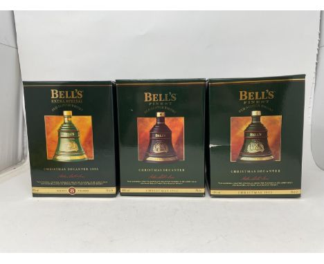 A Bell's 8 year old blended scotch whisky, in a commemorative decanter, 1995, boxed, and 11 others (12) 