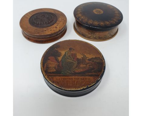 A 19th century snuff box, the lid decorated print of a lady and a goat, 9 cm wide, a treen snuff box with carved lid 9 cm in 