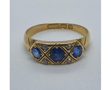 An 18ct gold, sapphire and diamond ring, ring size M 