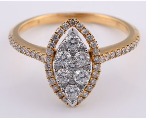 An 18ct gold marquise shape diamond cluster ring, ring size K55 points 