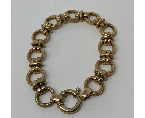 A 9ct gold ring link bracelet, 18.6g20 cm longOverall condition good no major faults found, light wareStamped 325 