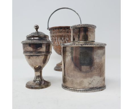 A Victorian silver oval caddy, London 1892, a George III silver pepper pot, 5.4 ozt, and silver plated basket (3) 