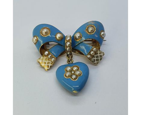 A gold, blue enamel and pearl bow brooch, with a heart shaped drop 