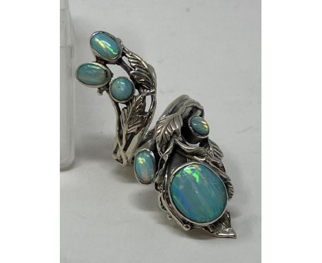 An Art Nouveau style silver and opal ring, Size MThis is a modern copy. 