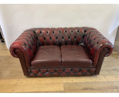 A red leather Chesterfield sofa, 161 cm wide 