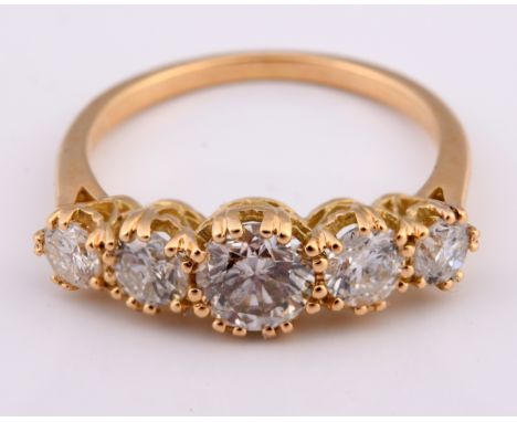 An 18ct gold and five stone diamond ring, ring size KDiamond weight 1.59ct approx. with the gemological report reference WG19