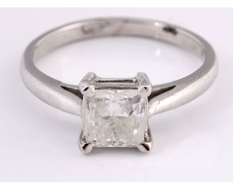 An 18ct white gold and solitaire princess cut diamond ring, ring size L 1/2 