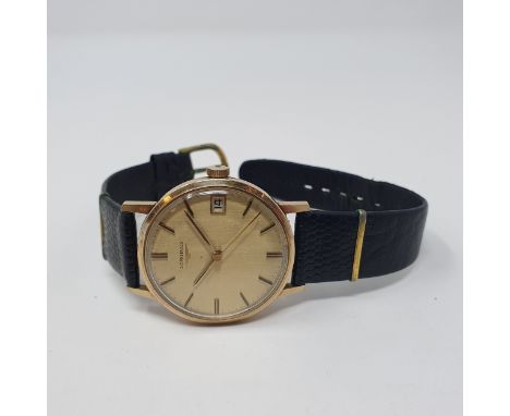 A gentleman's Longines wristwatch, with a leather strapYellow metal case untested, light scratches to case, we have seen this