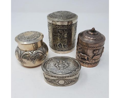 A Victorian silver caddy, Birmingham 1899, 7 cm high, a Dutch silver coloured metal oval box and two Indian caddies (4)All in