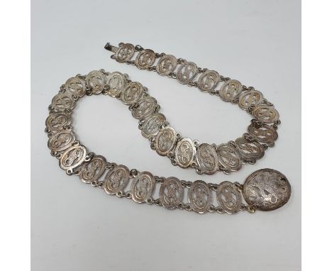 A Chinese belt, with oval pierced links86 cm long, 109.7 g Overall condition good  light ware 