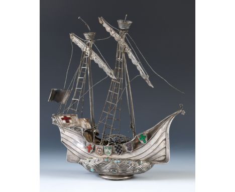 An Arts and Crafts silver coloured metal, enamel and gem set model of a galleon, 34 cm highUnmarked and untested, general wea