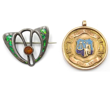 9ct gold 1925 Scarborough and District  football medal by Fattorini and an Arts and Crafts silver and enamel brooch by Charle