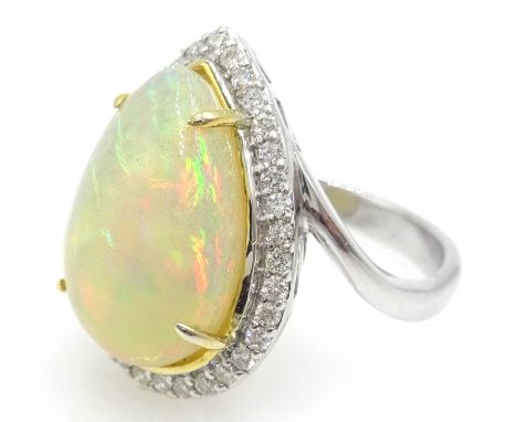 18ct white gold pear shaped opal and diamond cluster ring, stamped 750, opal 4.4 carat 