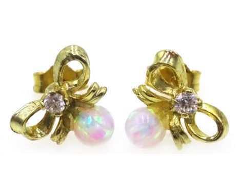 Silver-gilt opal bow ear-rings  Condition Report Click here for further images, condition, auction times & delivery costs