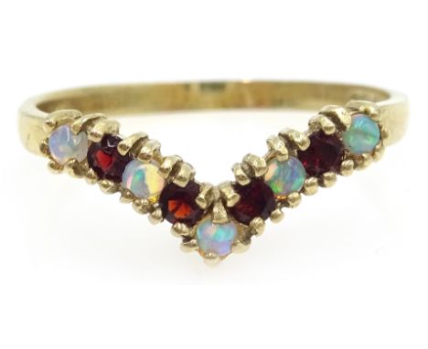 9ct gold opal and garnet wishbone ring, hallmarked Condition Report Approx 1.6gm, size PClick here for further images, condit