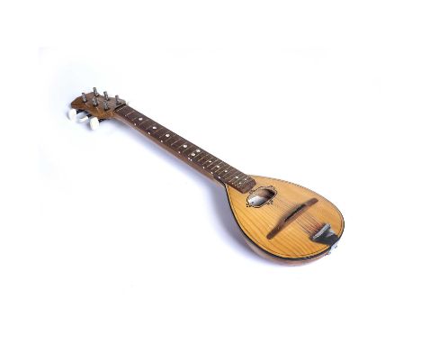 A Russian folk lute(?) with spruce body and attached label printed in cyrillic, 55cm overall