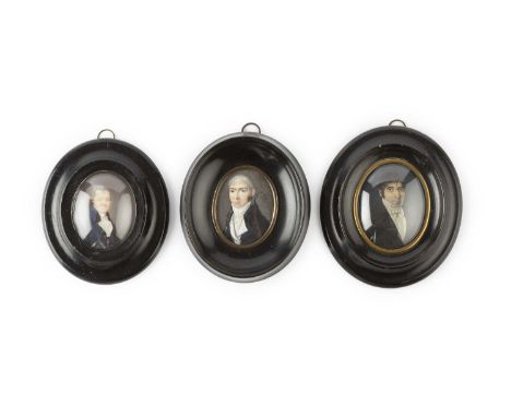 Continental school (late 18th century)A miniature oval portrait of a gentleman in blue coat and white stock, signed 'Toppino'