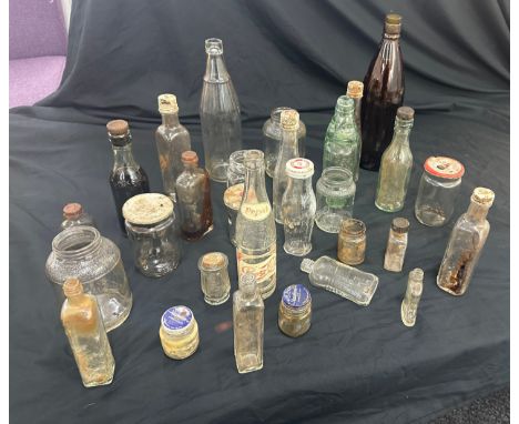 Large selection of vintage and later glass bottles includes pepsi cola bottle, medicine bottles etc 
