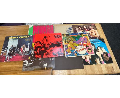 Selection of assorted records includes Status Quo, The Beatles, the Rolling Stones, The Who etc 