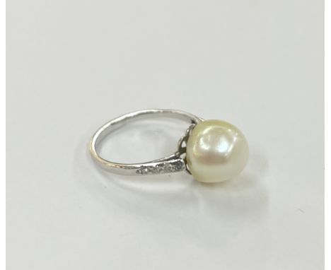 Vintage unmarked platinum and diamond ring set with pearl, uk size J weight 2.7 grams